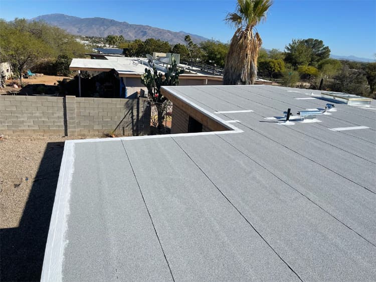 Built-up roofing Tucson hero image Universal Roofing crew performing built-up roofing in Tucson